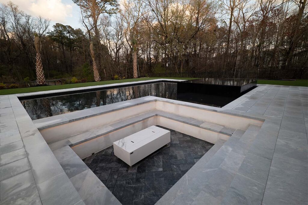 Modern Apex in Apex, North Carolina during dusk. Showcasing sunken fire pit lounge
